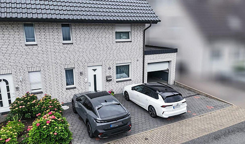 Gepflegte Doppelhaushälfte mit Einliegerwohnung, Garten & Garage in Bielefeld-Heepen