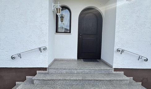 Small cottage on the edge of the forest