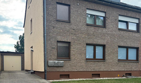 FOR SALE: Apartment building with 3 rental units, garden and garage