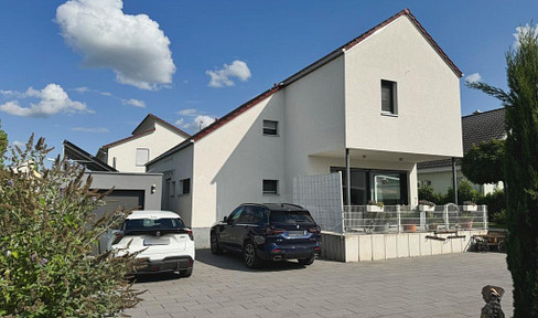 Fantastic detached house with individual architecture in Kirrlach!