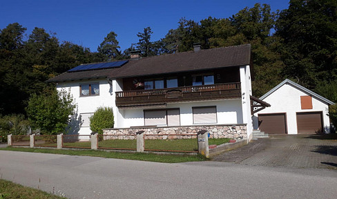 Two-family house with beautiful large garden