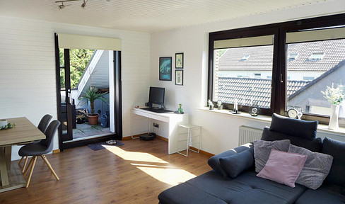 Attractive penthouse apartment with views of the greenery.