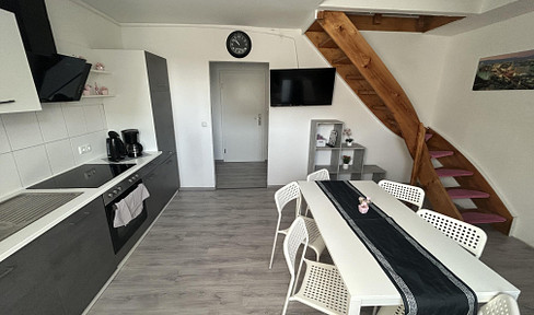 Stylish and close to the city: bright 3-room maisonette apartment in a quiet location