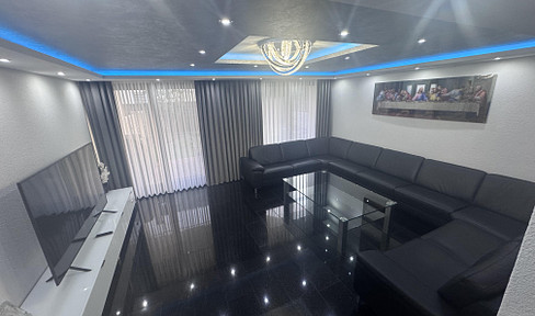 House-within-a-house feeling: Exclusively renovated maisonette with garage & luxurious fittings