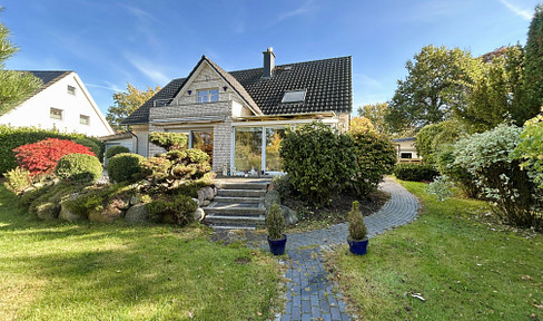 Two-family house with idyllic garden in play street location