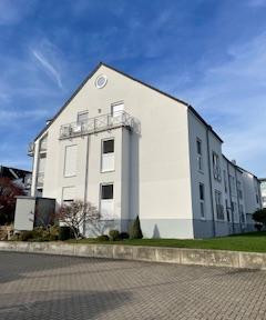 Well-kept 3-room apartment with terrace, garden, carport and underground parking space