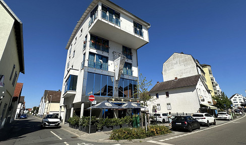 Well-kept apartment building with commercial unit in the city center of Langen!