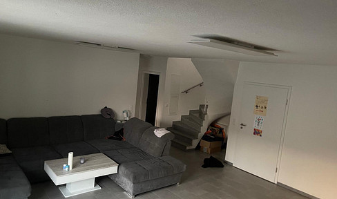 Modern maisonette apartment with 6 rooms, 141 m² living space and two parking spaces - year of construction 2022
