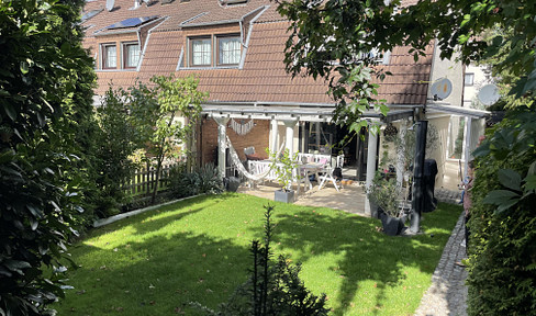 Attractive end terraced house with granny apartment, garden & carport - plenty of space for family & more