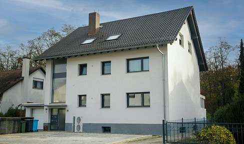 Attractive multi-family house with 4 apartments, fully rented, and energetically renovated to meet the standards of an "Efficiency House 70."