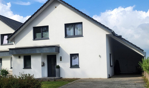 Low-energy semi-detached house in Seevetal-Ohlendorf directly on the edge of the Buchwedel forest - commission-free