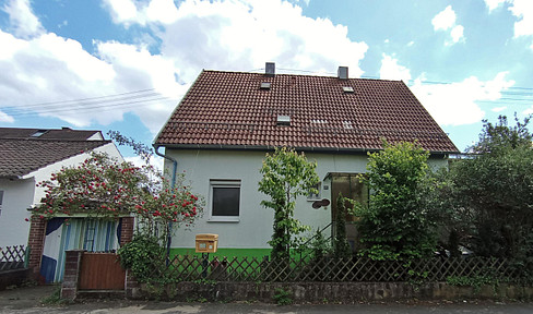 Energy-efficiently renovated house with garden and garage