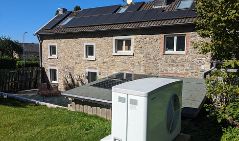 Energy-efficient country dream: Modernized quarry stone house, 3,200m² plot