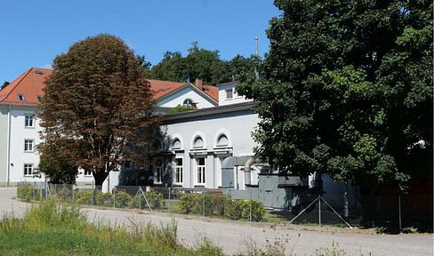 Your new company headquarters! Company building with production halls, warehouse and office space near the A94 motorway