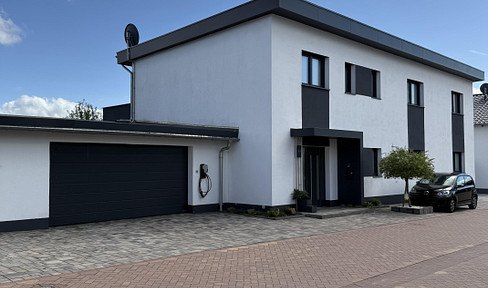 Commission-free: Architect's house in Roxheim A+ with PV system, heat pump & flexible 2 residential units