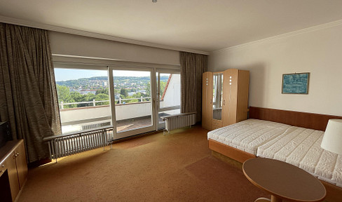 Möbliertes 1-Zimmer-Apartment mit Küchenzeile und Balkon