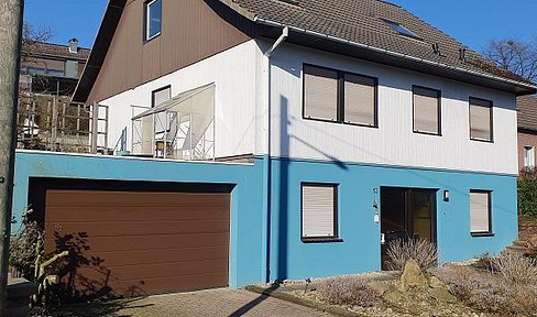 Detached family home with double garage, very large usable area and garden with raised bed.