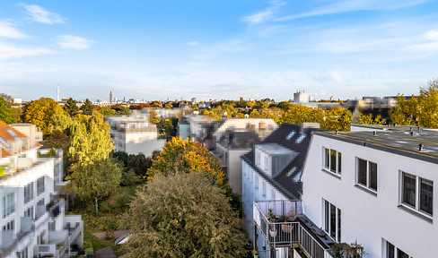 Exclusive penthouse maisonette apartment with two roof terraces above the rooftops of Hamburg
