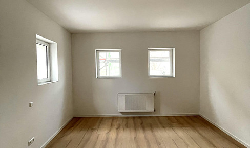 Modern first floor apartment with 75 m² - first occupancy after renovation in a central location