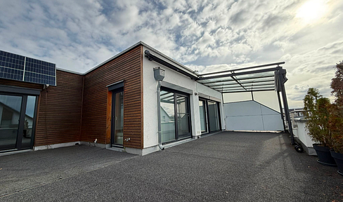 Light-flooded 4-room penthouse apartment on 165m2 with 60m2 roof terrace