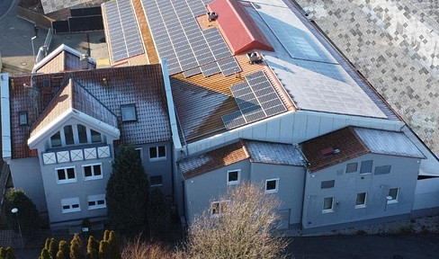 Multifunctional commercial building with office and living space