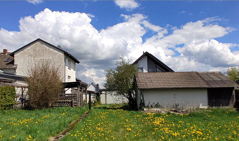 Charming detached to semi-detached house with large garden and potential for individual design