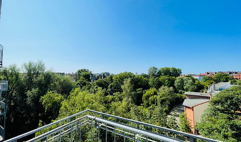 A different kind of view! Large city view, with views to both the east and west. (5 rooms)