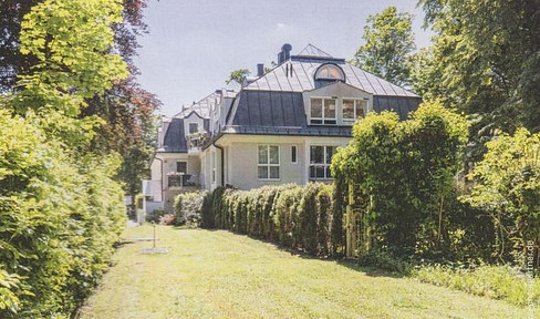 Exceptional garden apartment in Nymphenburg, spanning two floors and located in a prime location.