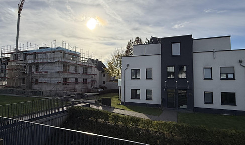 Modern 3-room new-build apartment with private garden on the first floor