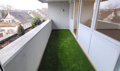 Very well-kept 3-room apartment with balcony, fitted kitchen and parking space