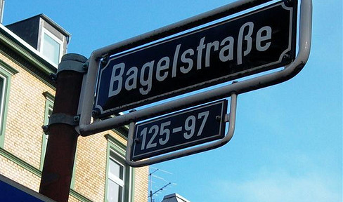 Old apartment building with new building in the courtyard