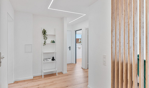 Bright, high-quality renovated 3-room apartment with two balconies & underground parking space