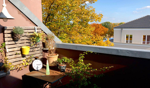 Living above the rooftops: Bright 2-room apartment with terrace