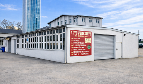 Commercial hall with roller doors, office space, and a large open area for rent.