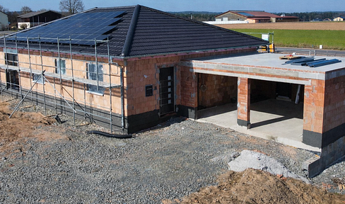 Bungalow with double garage - construction phase completed.