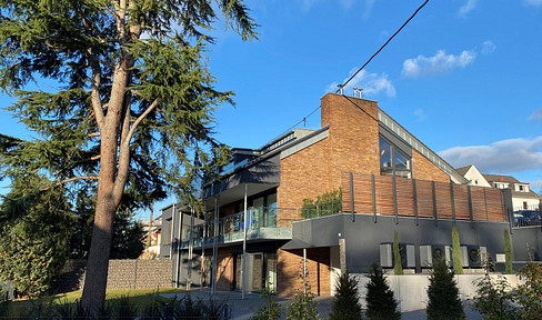 Attraktive Wohnung mit eigener Zufahrt und Garten