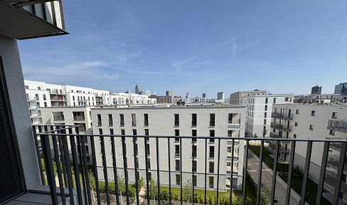 New build first occupancy: 2-room apartment with skyline view, south-facing balcony and high-quality kitchen