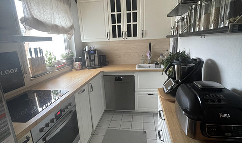 3.5 room apartment on 2 floors with balcony and janitor service