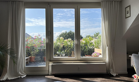 Exklusive Dachgeschosswohnung mit Balkon inkl. 2 Stellplätze