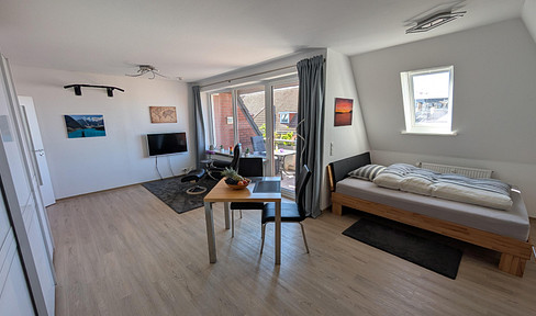 RESERVED - Modern and spacious apartment with a view, located above the rooftops of Bergedorf – quiet and centrally located + includes a parking space in an underground garage.