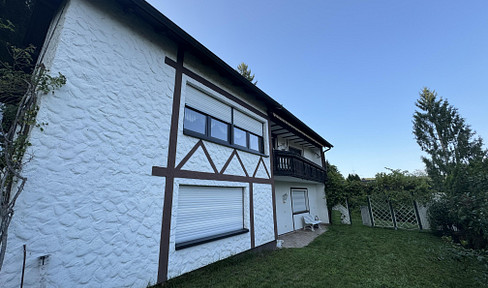 Großzügiges Einfamilienhaus mit Einliegerwohnung in bester und ruhiger Süd-und Waldrandlage