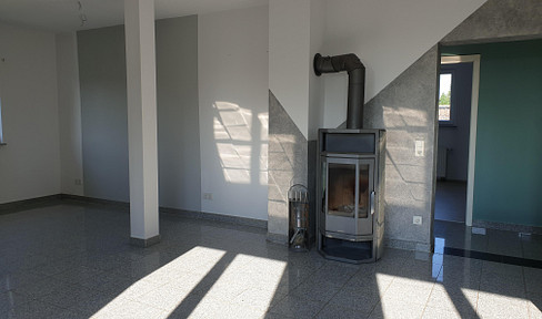 Cozy attic apartment with a sunny rooftop terrace and a fireplace, available immediately.