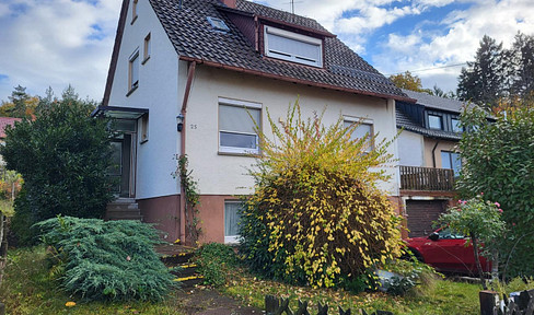 Kleines reparaturbedürftiges Einfamilienhaus mit schönem Garten in sehr guter Wohnlage