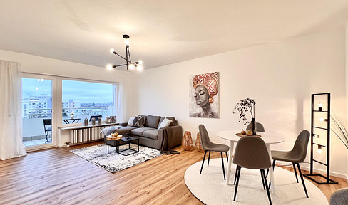 Living above the rooftops - renovated 3-room apartment on the 5th floor with south-west-facing balcony, elevator and underground garage