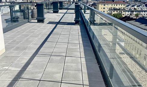 FIRST MOVING IN - Modern 2-room loggia apartment (approx. 59 m²) right next to the U1 underground line and the main station