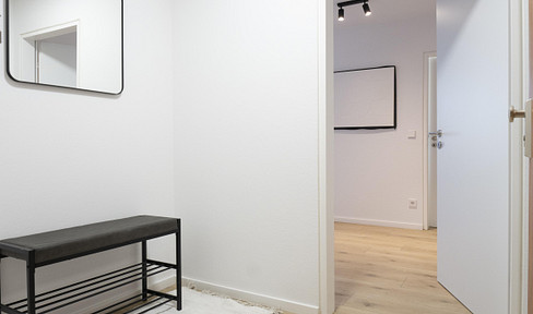 Frisch modernisiert! 2-Zimmer-Wohnung mit Balkon & Tiefgarage in der Stadtmitte