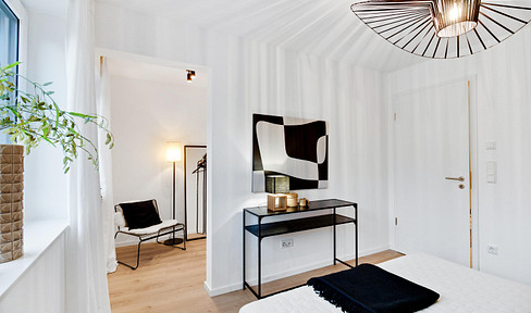 Sustainability meets living comfort! First floor apartment with garden, KFW 40 NH standard