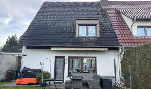 Familienfreundliche Doppelhaushälfte mit Ausbaupotenzial und Garten in ruhigem Wohngebiet