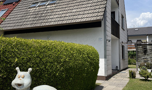 Semi-detached house with a large garden and potential for renovation in the musicians' district of Geretsried.