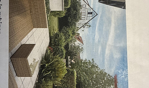 Stylish apartment with large garden, terrace and garage.